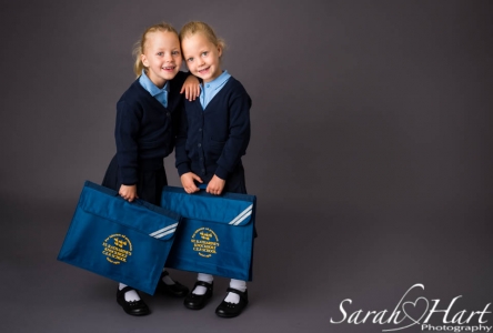 Double trouble twin schoolgirlsl,  portraits by Sarah Hart, Kent family photographer