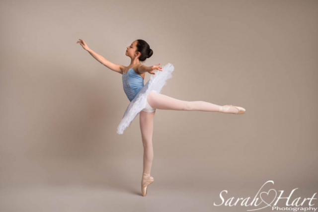 elegant arabesque of a young ballet dancer on pointe