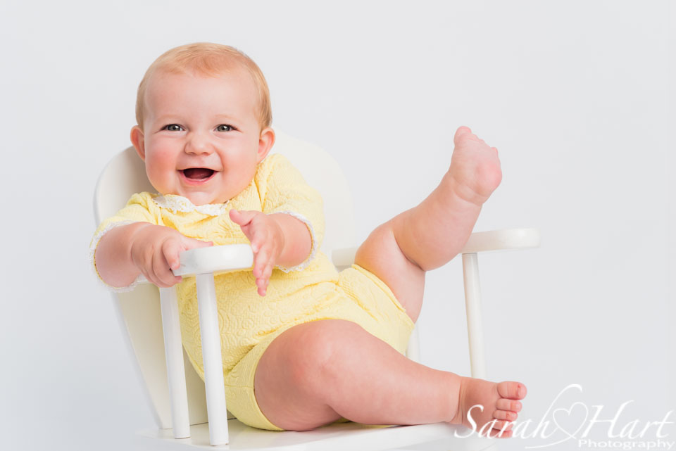 yellow romper suit, 6 months and chubby rolls, big smiles baby 6 months old