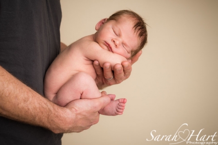 Baby boy sleepy in daddy's hands, only this tiny once, baby photoshoot maidstone