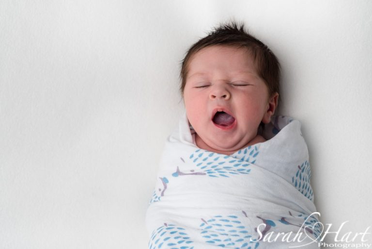 Newborn Photography by Sarah Hart Photography Swaddle your baby to help