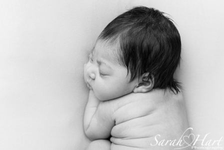 newborn baby girl in profile, best newborn photographer tonbridge