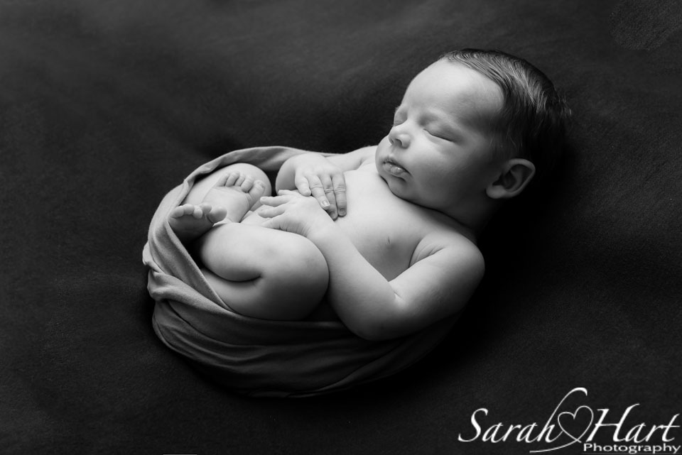 black and white image of newborn, best newborn photographer near me