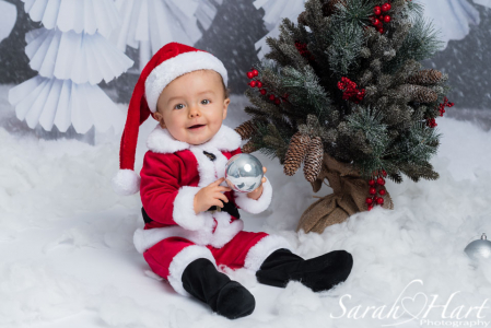 xmas mini session boy in santa outfit, family photographer