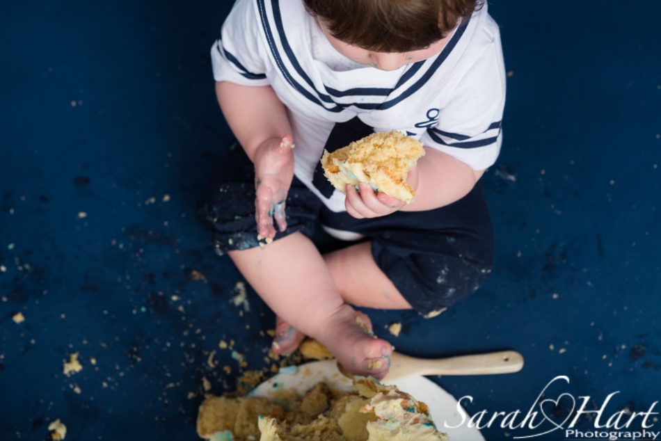 Little boy with a big chunk of cake, kent baby photographer