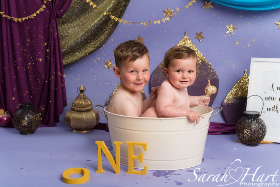 Two little ones in the bath at Aladdin cake smash in Tonbridge, Kent